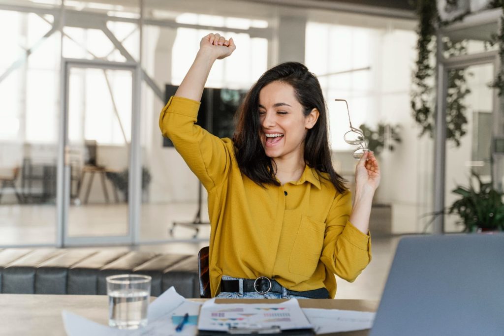 happy businesswoman finishing a project 2