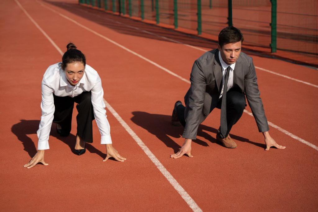 full shot people running in suits